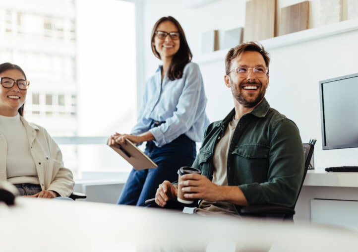 professionals listening to a discussion in an office